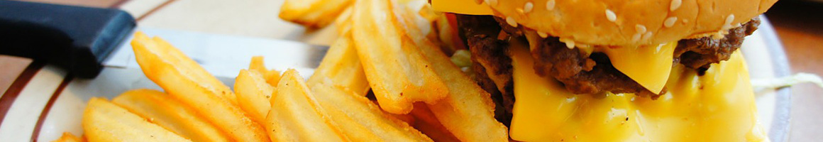 Eating American (Traditional) Burger Pub Food at Fresh Horses Saloon restaurant in Harrisburg, SD.